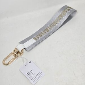 LULULEMON Never Lost Keychain Vapor Gold Brand New NWT